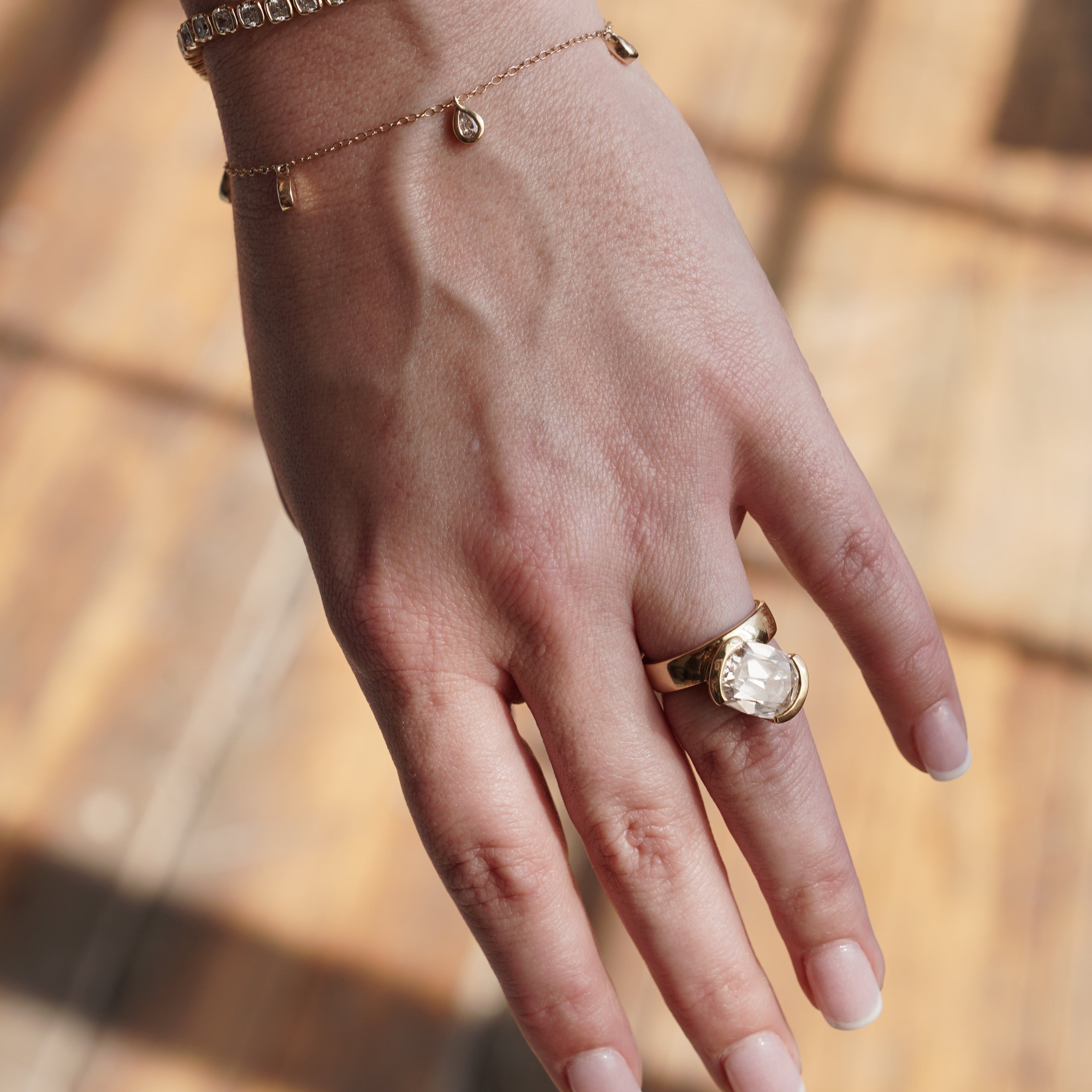 bracelet on model paired with jewelry from SETTE