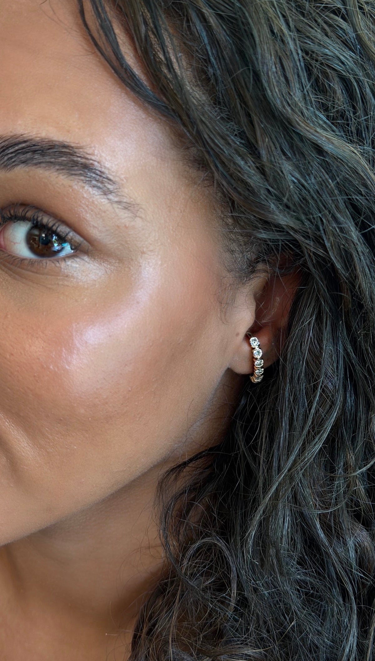 woman wearing the arc earring