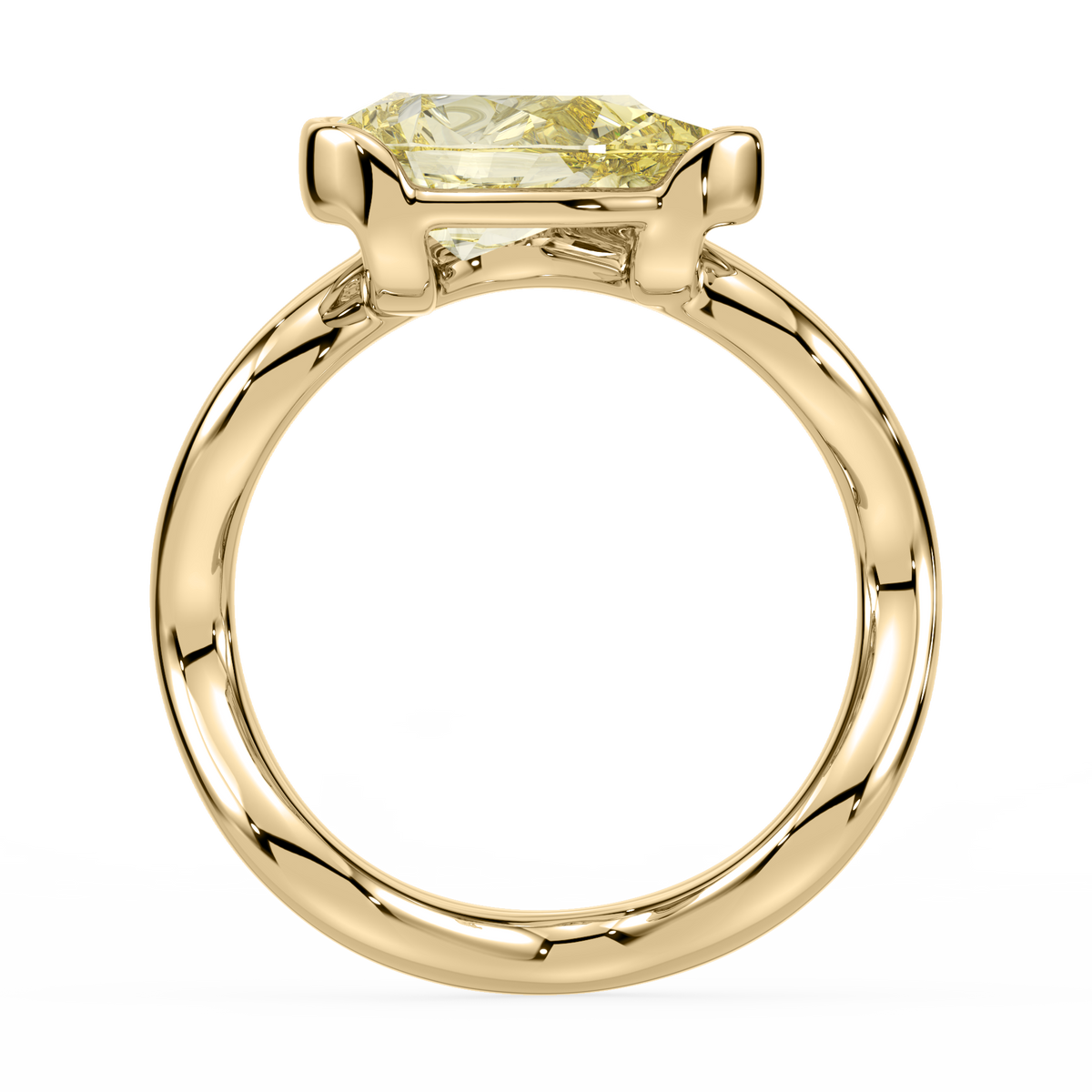 Gold ring with a yellow lab diamond on a white background