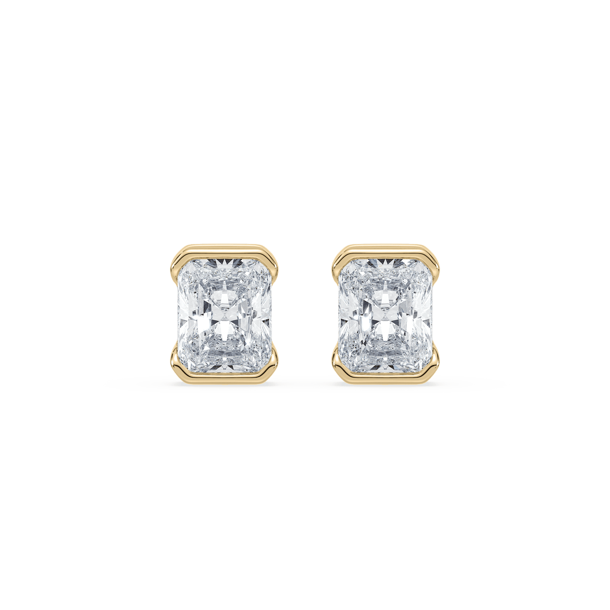 A pair of 14K yellow gold radiant cut diamond stud earrings with a bezel setting