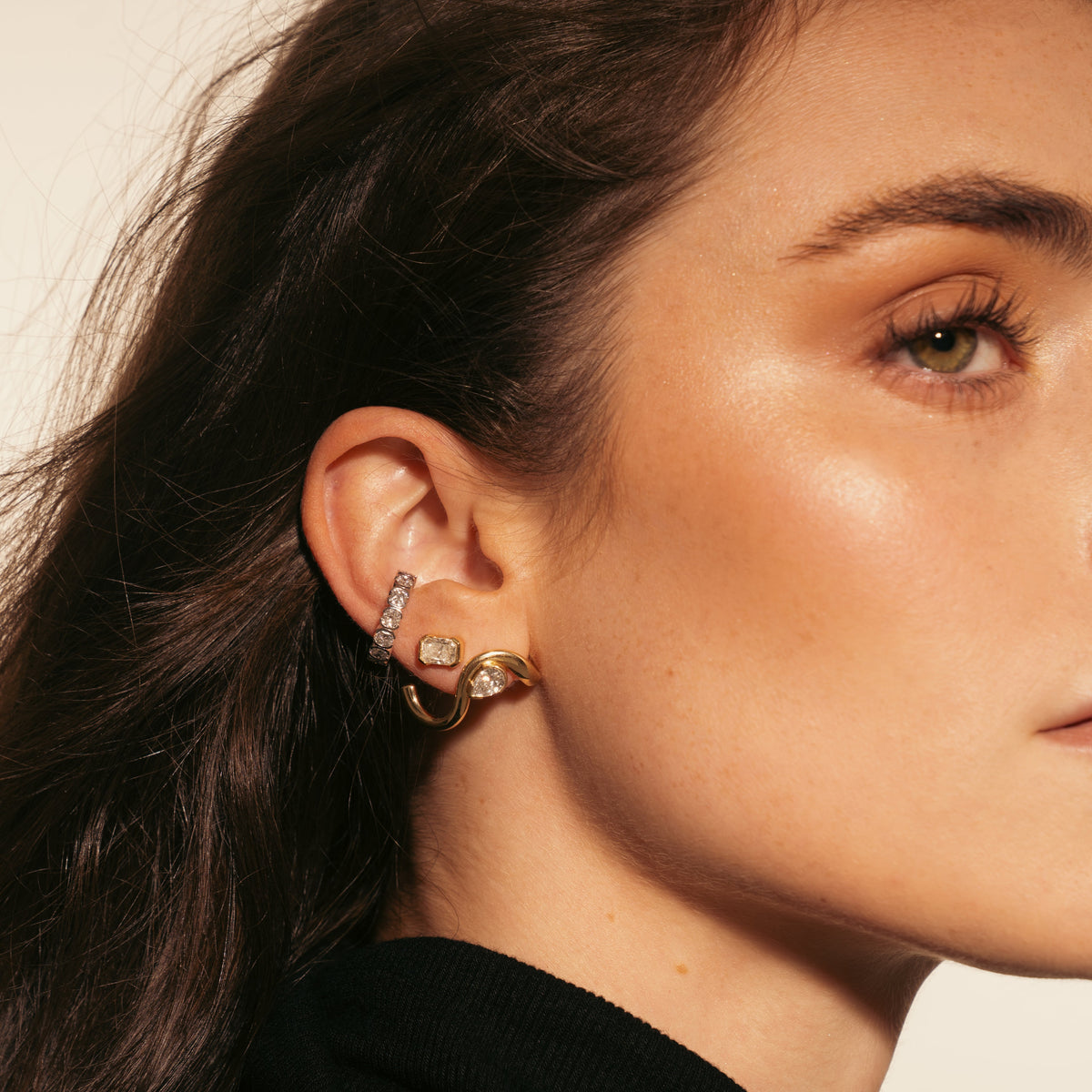 Model wearing a cascading lab diamond ear cuff from SETTE Jewelry.