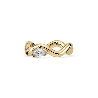 0.2 CT pear-shaped lab diamond ring in an 18K yellow gold sculptural band on a white background.