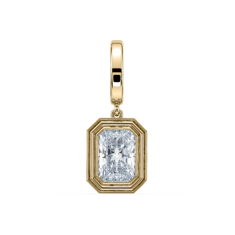 Gold pendant with a large rectangular diamond on a white background