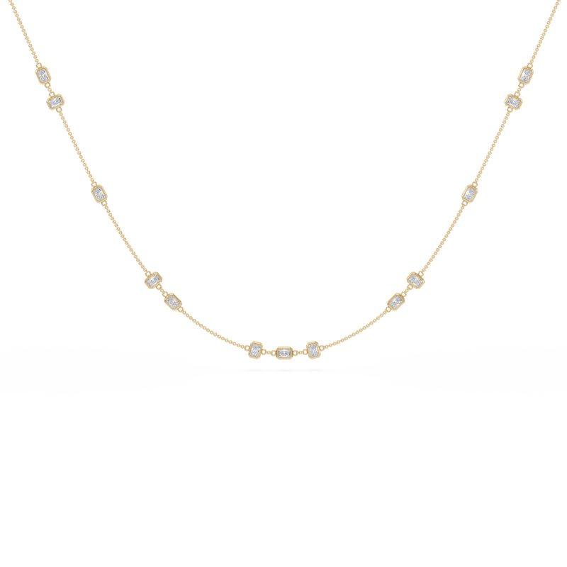 Gold necklace with small diamonds on a white background