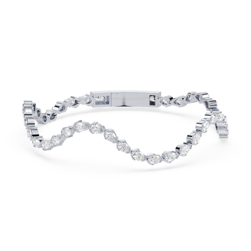 Front view of the Coquette Lab Diamond Tennis Bracelet in 14K white gold, showcasing its sculptural scallop design.

