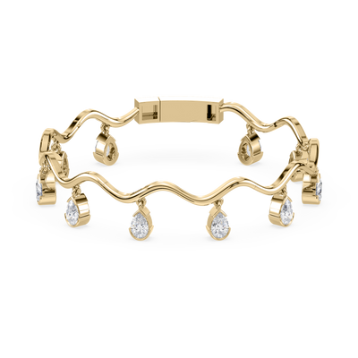 Front view of the Coquette Lab Diamond Fringe Bracelet in 14K yellow gold, showcasing ten dangling pear-shaped lab-grown diamonds.

