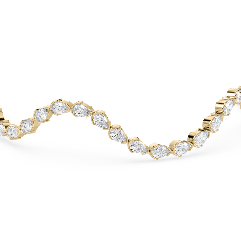 Close-up of the bracelet's Signature Tiger Clasp in 14K yellow gold.

