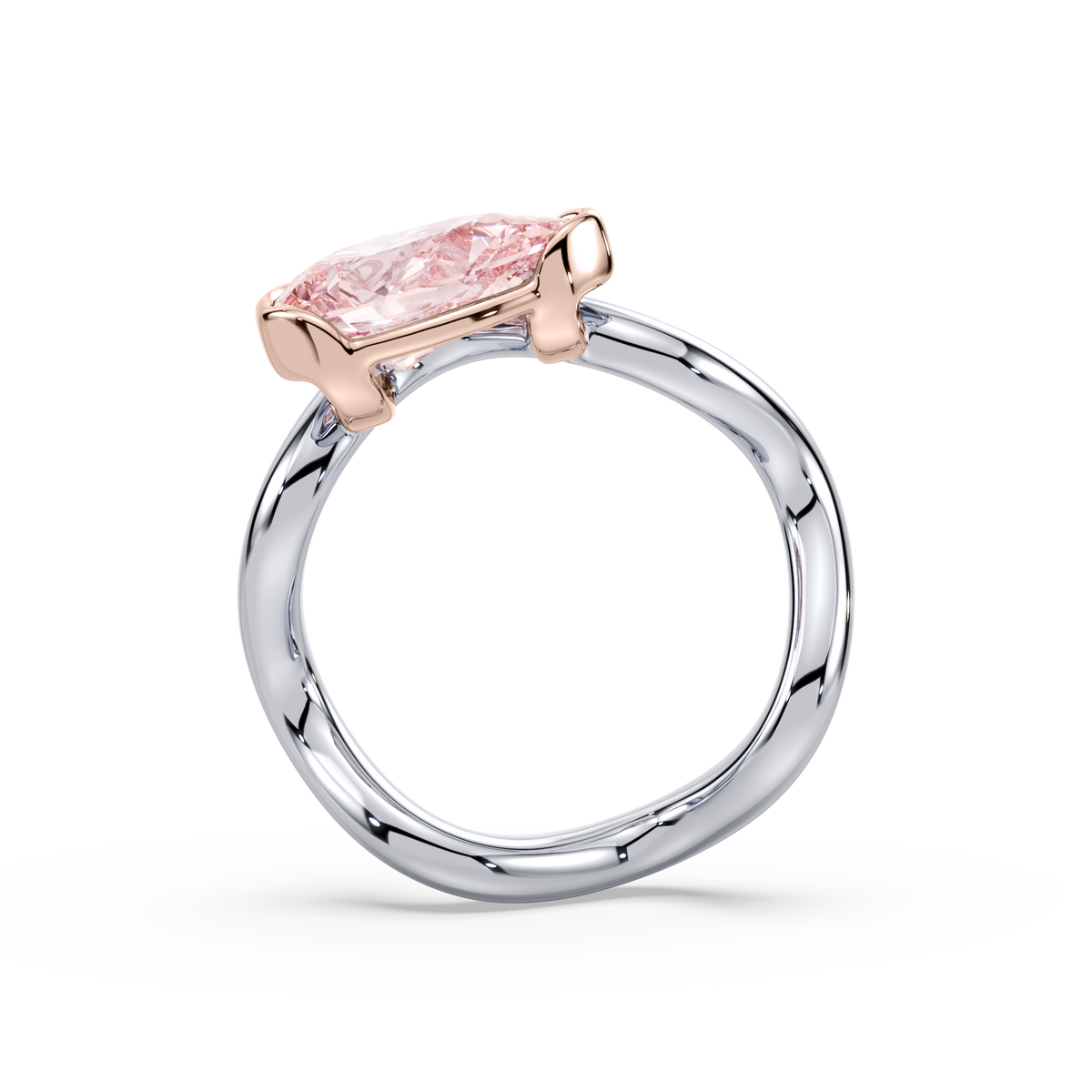 Pink lab diamond ring set in an 18K rose gold basket with a sterling silver band shown from the side.