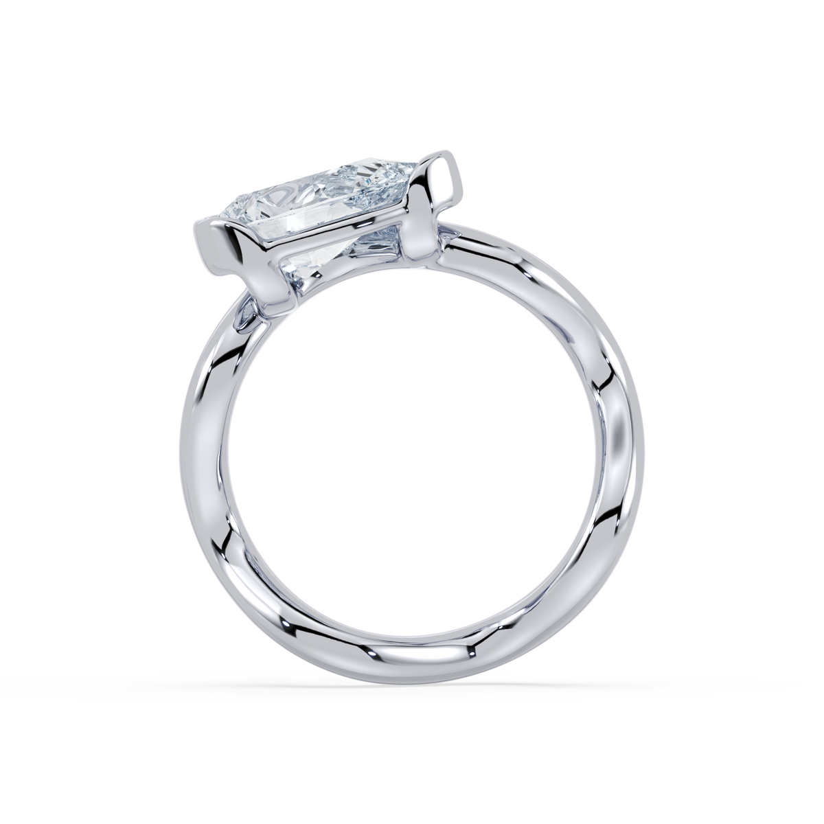 A single Coquette Pinky Ring with a large clear diamond set in a curved, scalloped, 18KT white gold band.