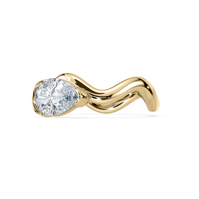 A single Coquette Pinky Ring with a large clear diamond set in a curved, scalloped, 18KT yellow gold band.