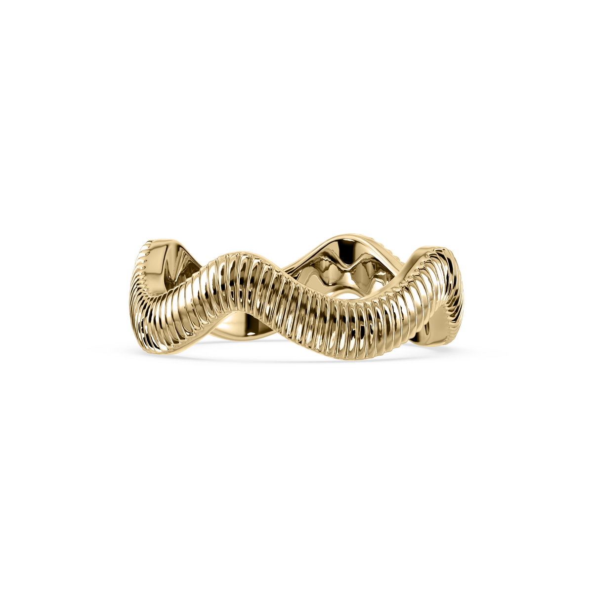Close-up of a fluted sculptural gold ring held in a jeweler’s tool.