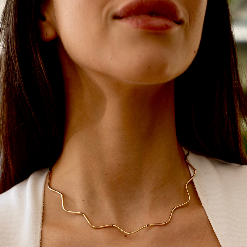 Model wearing the Coquette Wave Necklace