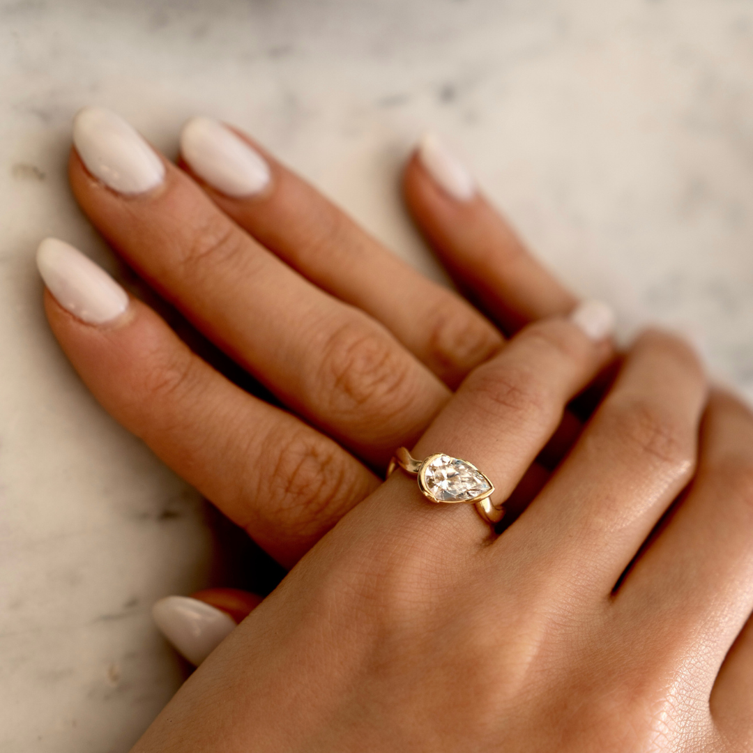 coquette pinky ring on model
