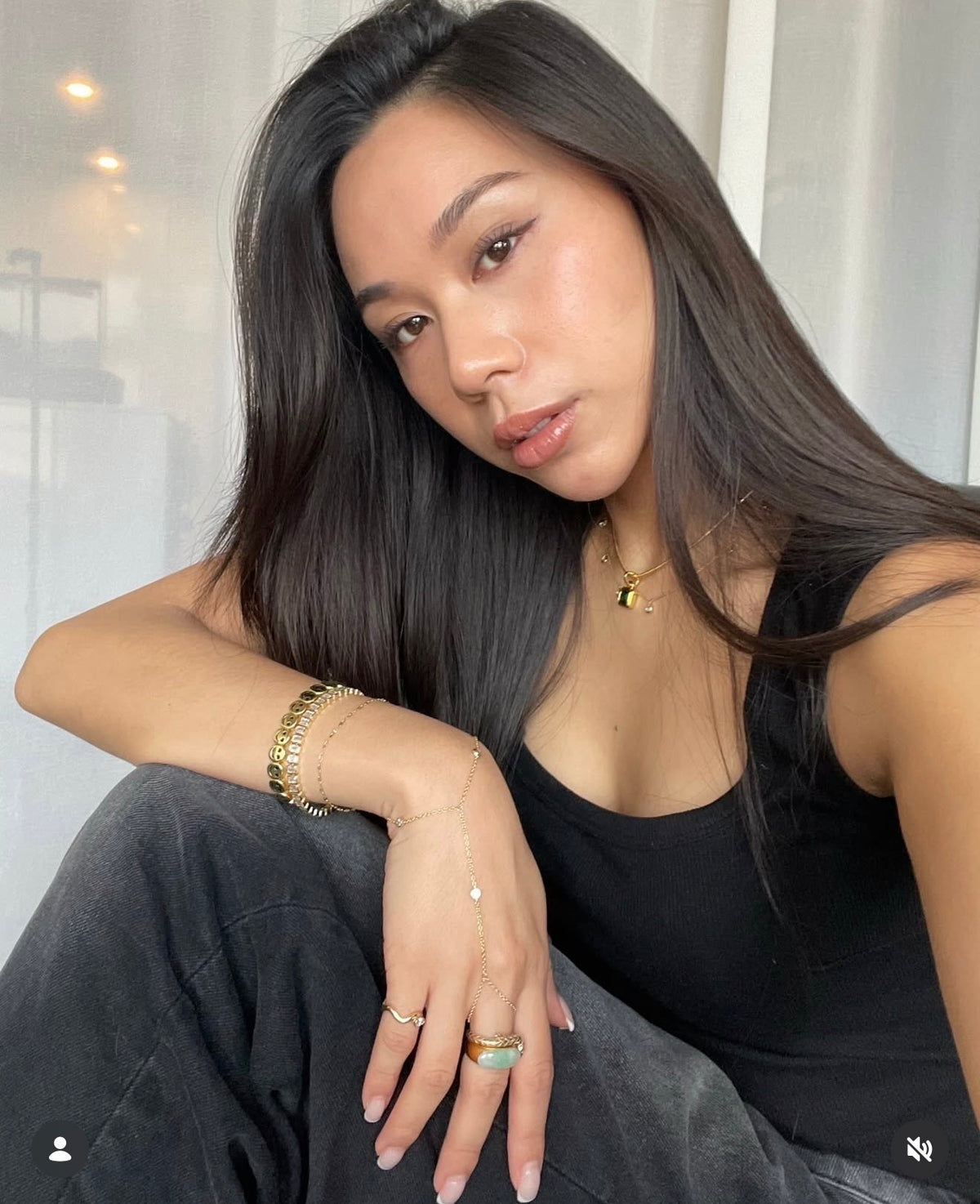 Cool girl wearing the coolest pinky ring in her stack