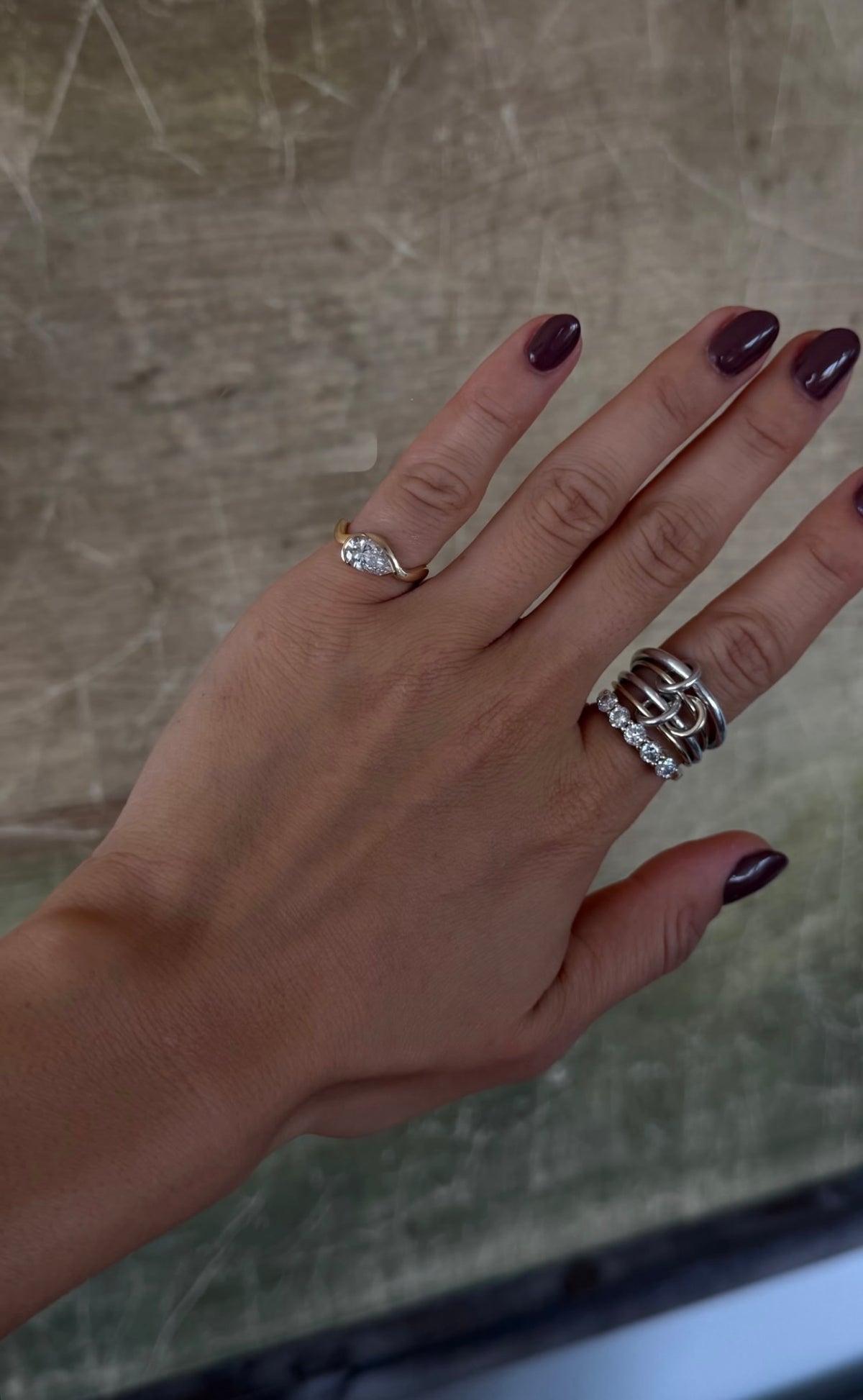 Influencer Lauren Wolf wearing the coolest pinky ring in her stack