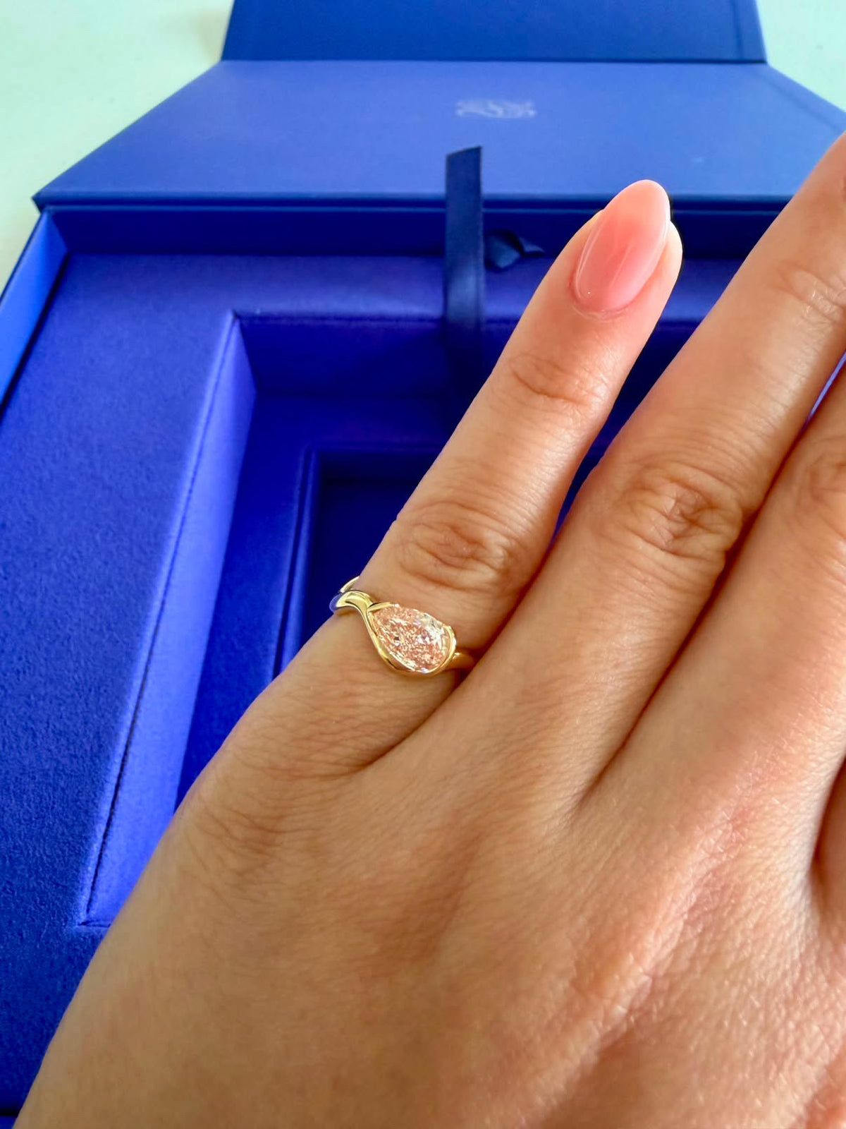 Client wearing her Pink Coquette 1.0 Pinky ring with beautiful oval nails