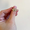 showing all sides of the deco radiant ring with side brilliant trapezoids
