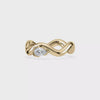 0.2 CT pear-shaped lab diamond ring in an 18K yellow gold sculptural band viewed 360.
