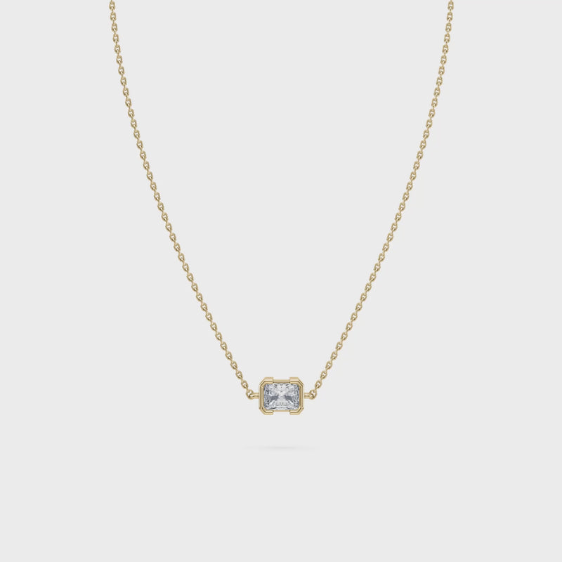 Front view of the Muse Radiant Lab Diamond Pendant in 14K yellow gold, showcasing its radiant-cut lab diamond in a half-bezel setting.