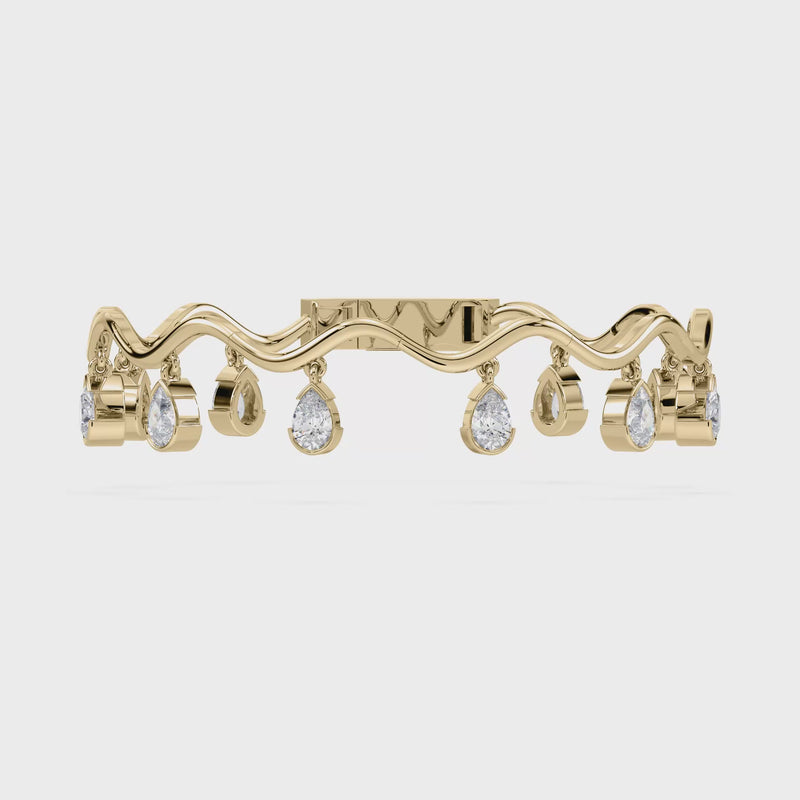Front view of the Coquette Lab Diamond Fringe Bracelet in 14K yellow gold, showcasing ten dangling pear-shaped lab-grown diamonds.

