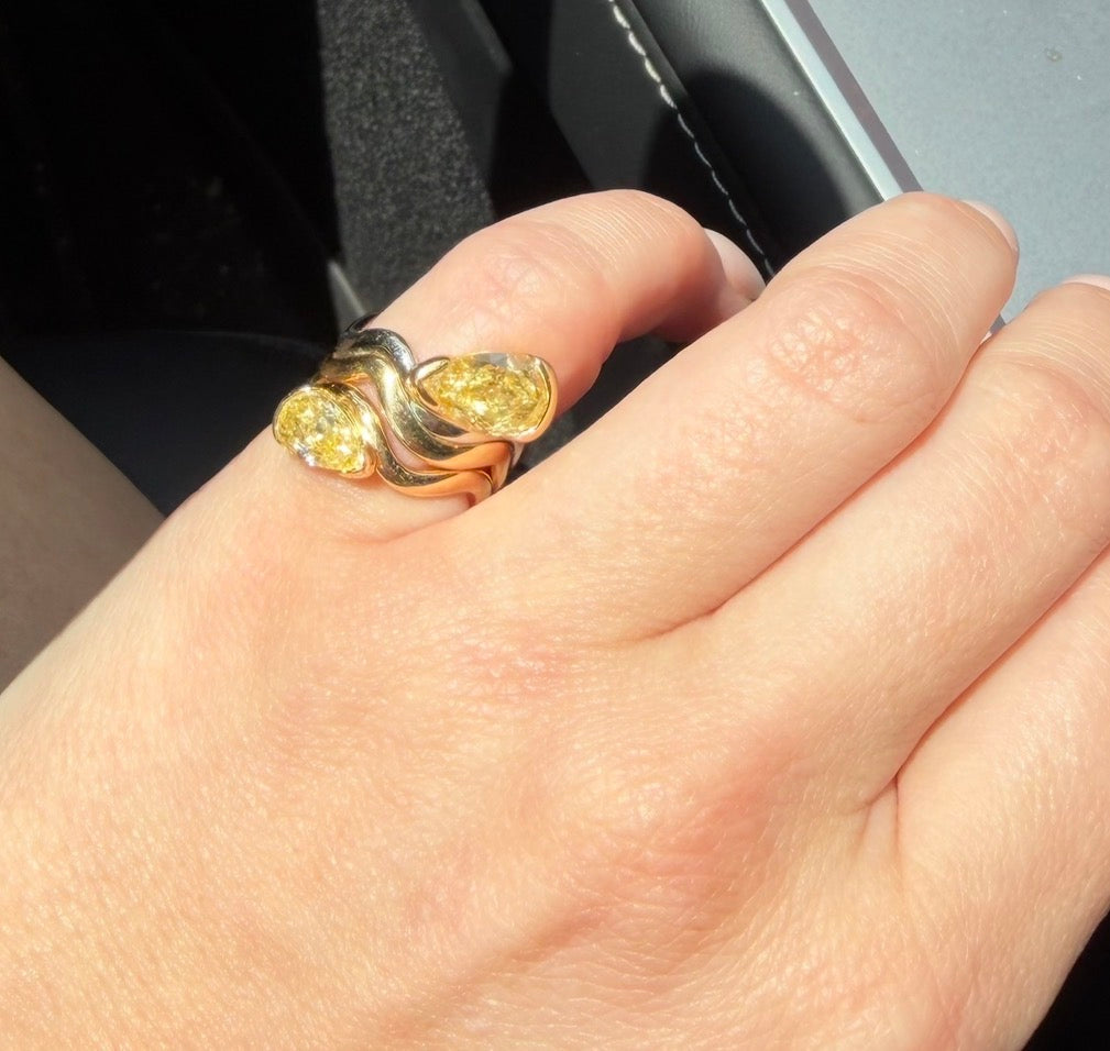 pinky rings stacked in sunlight
