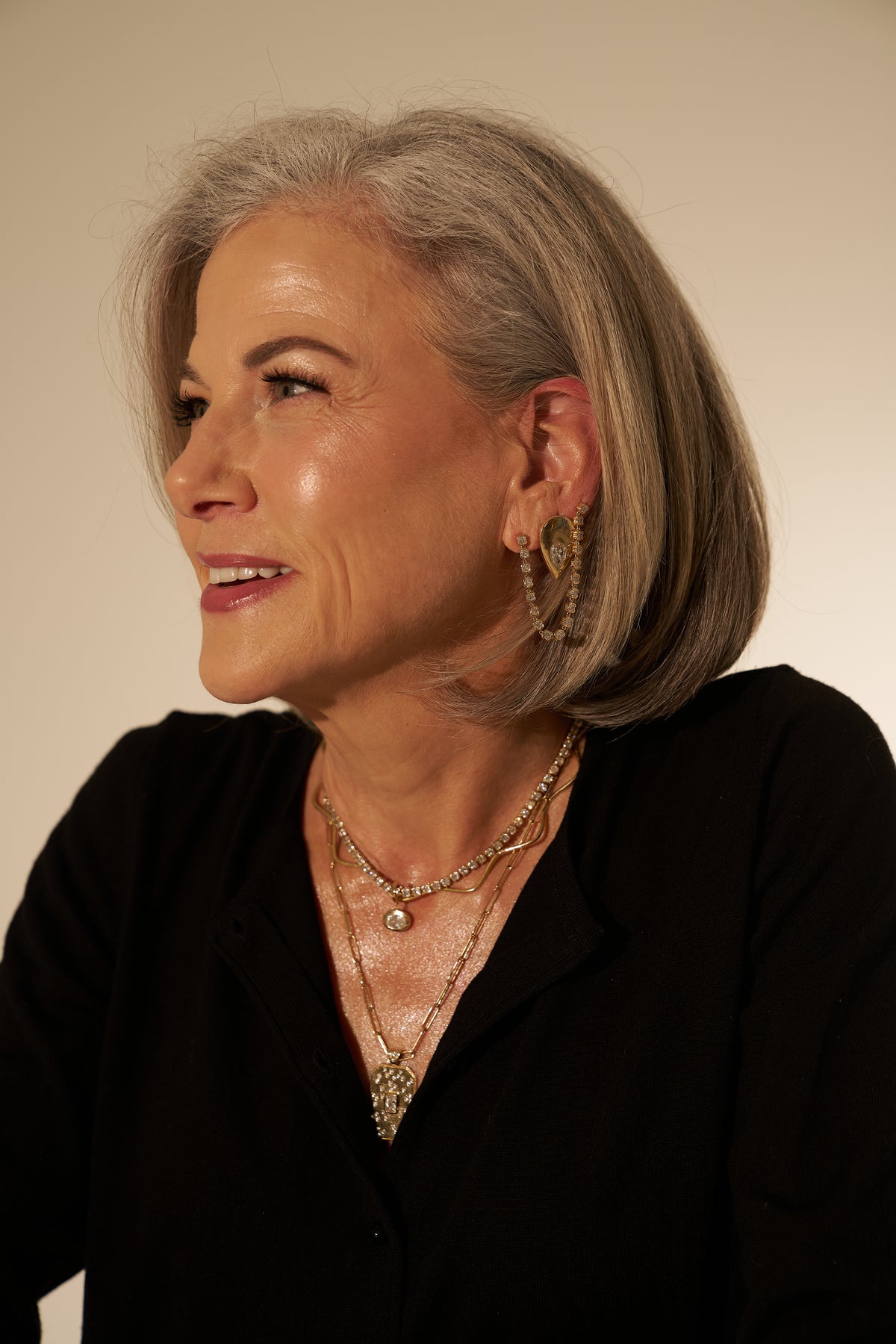 older woman rocking cool earring stack