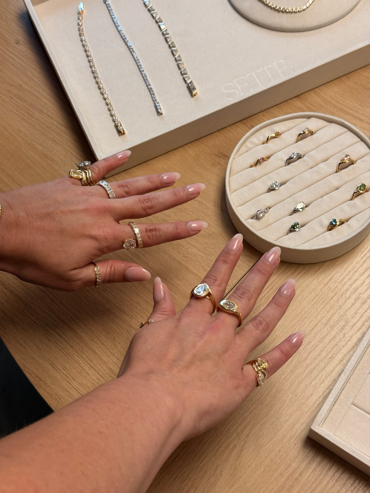 woman shopping for new jewelry and showing off new purchases