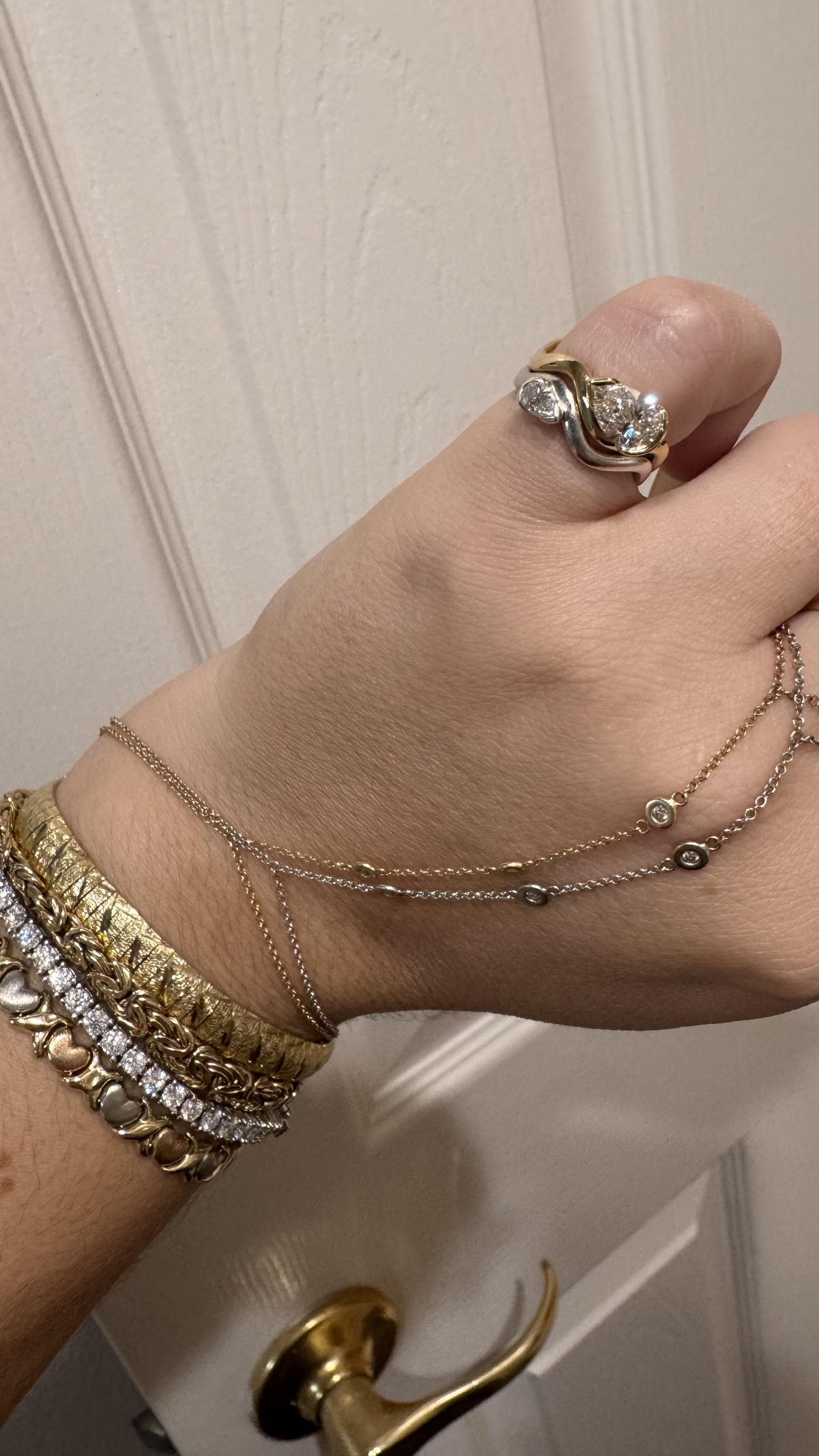 woman wears her pinky rings